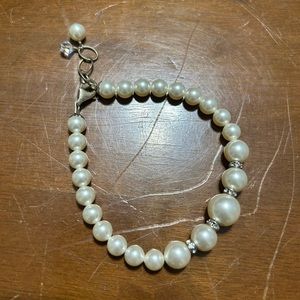 Faux pearl bracelet with matching earrings.